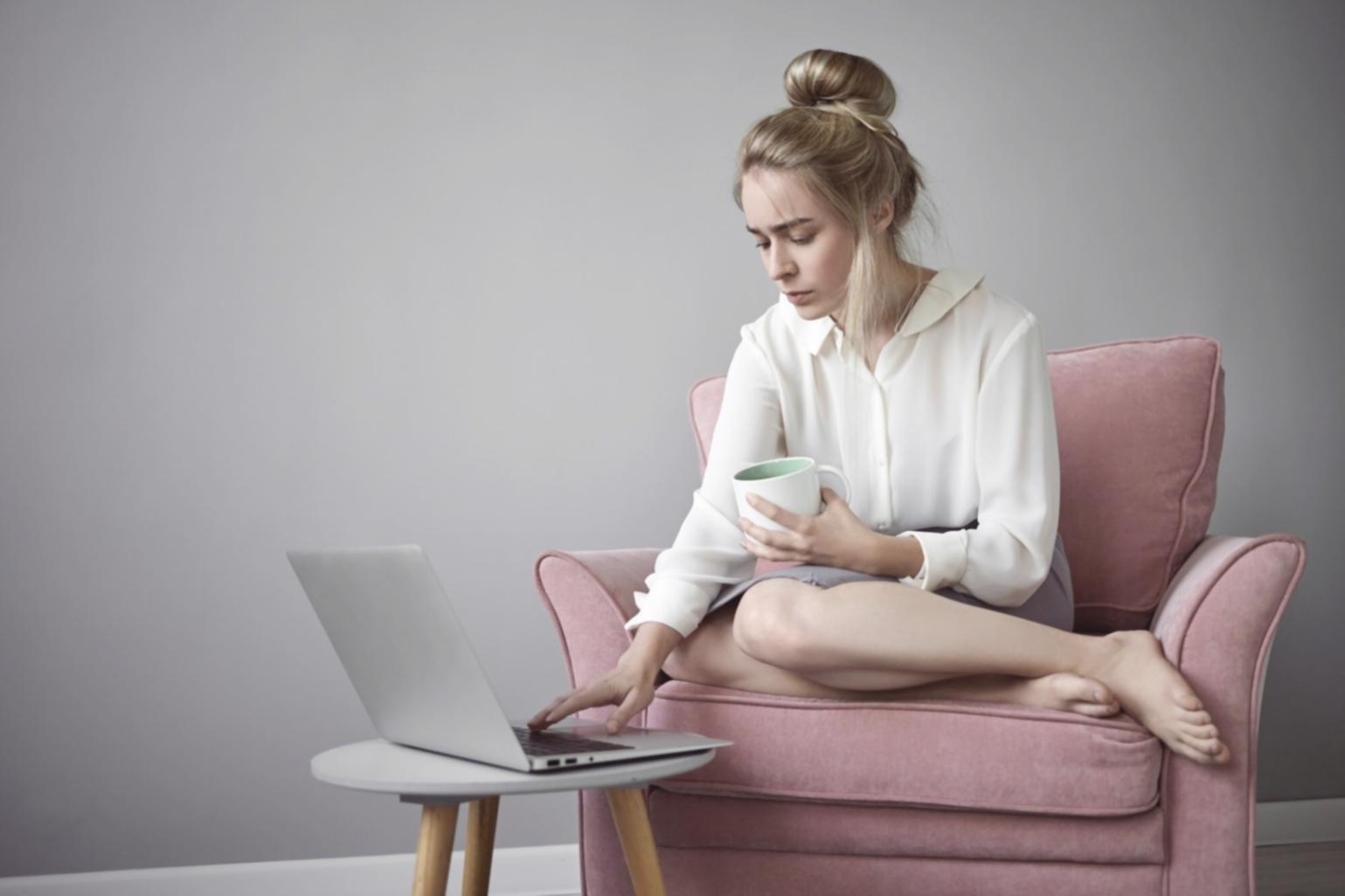 Entrepreneur reviewing business model canvas and market research data